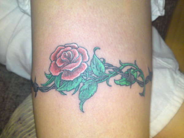 rose and wire tattoo