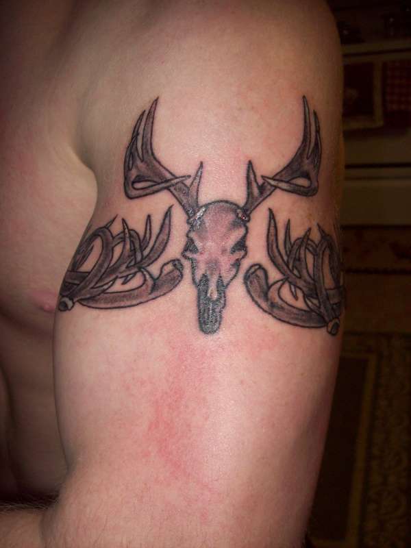 deer antler armband tattoos