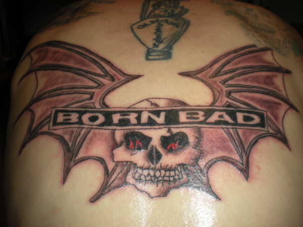 bat wing skull tattoo