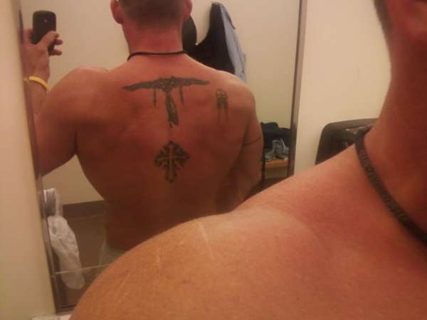 cross on back tattoo
