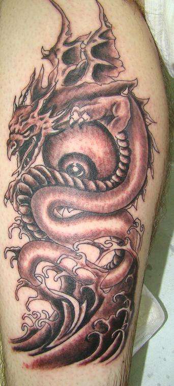 dragon fantasy black and grey tattoo