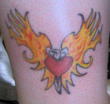 heart with flames tattoo
