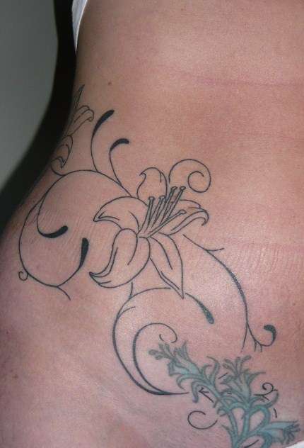 Flower tat tattoo