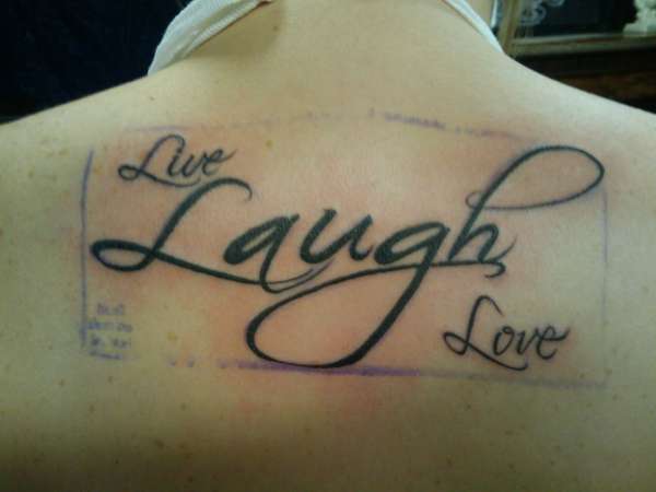 LAUGH , LOVE tattoo.