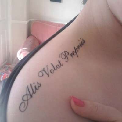 'She Flies By Her Own Wings' tattoo