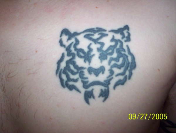 white bangle tiger tattoo