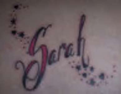 "Sarah" on Lower Back tattoo