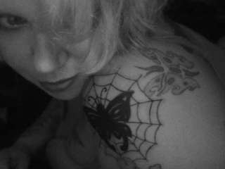 spiderweb butterfly tattoo
