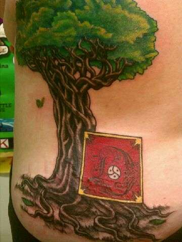 Banyan tree with letter D tattoo