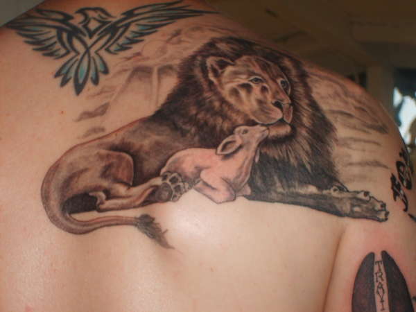 Lion and Lamb tattoo
