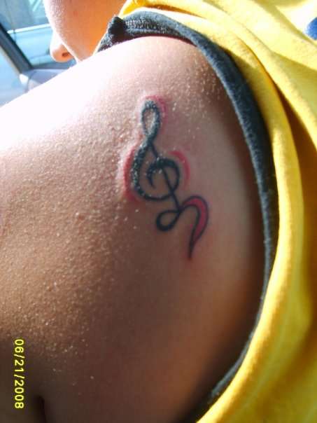 Music note and heart tattoo