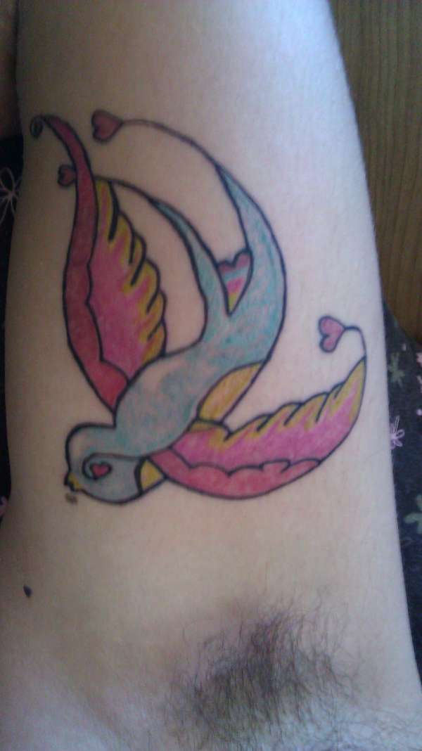 Sailor jerry swallow left arm tattoo