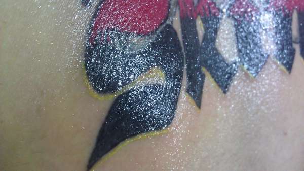 Skin logo tattoo