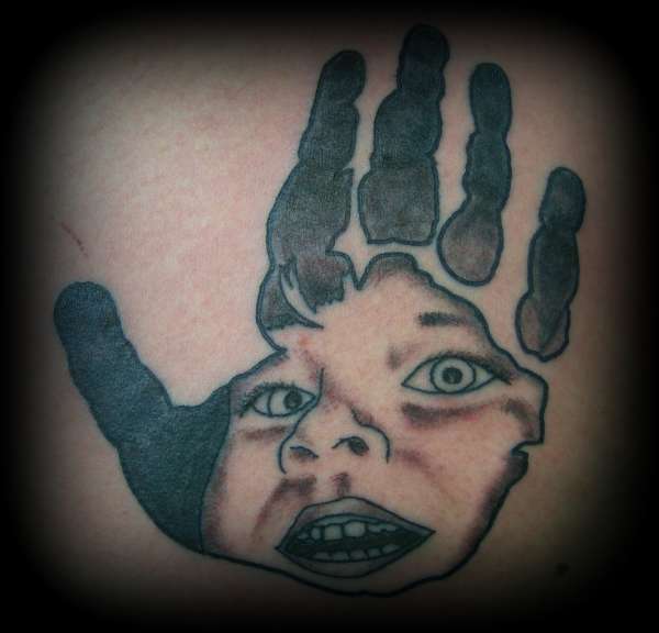 baby and baby hand tattoo