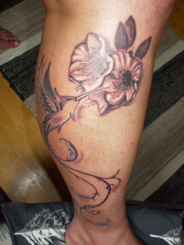 flower/bird tattoo