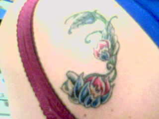 unfinished flower tattoo tattoo