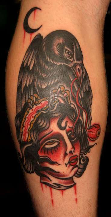 severed head raven tattoo