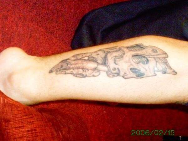 skull machine tattoo