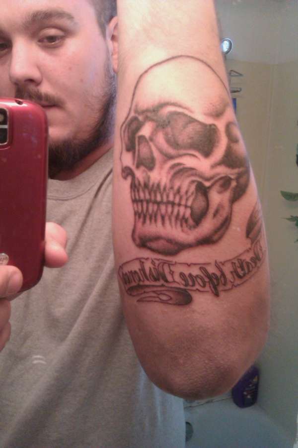 skull with banner tattoo