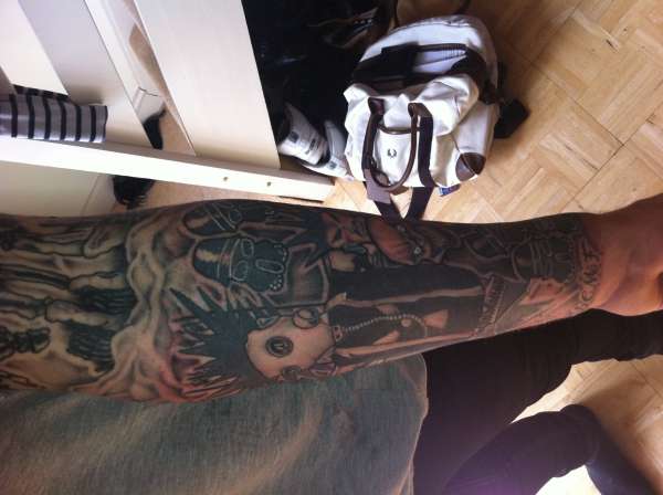 Left sleeve forearm tattoo