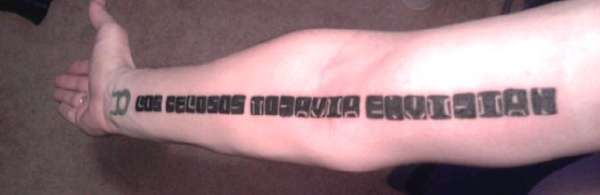 arm tattoo in spanish tattoo