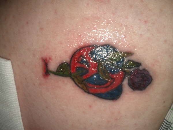 bree make love not war tattoo
