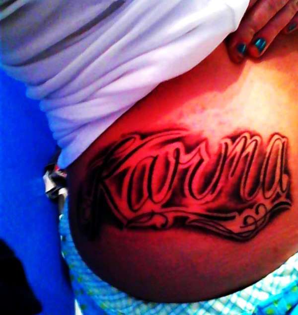 karma right side tattoo