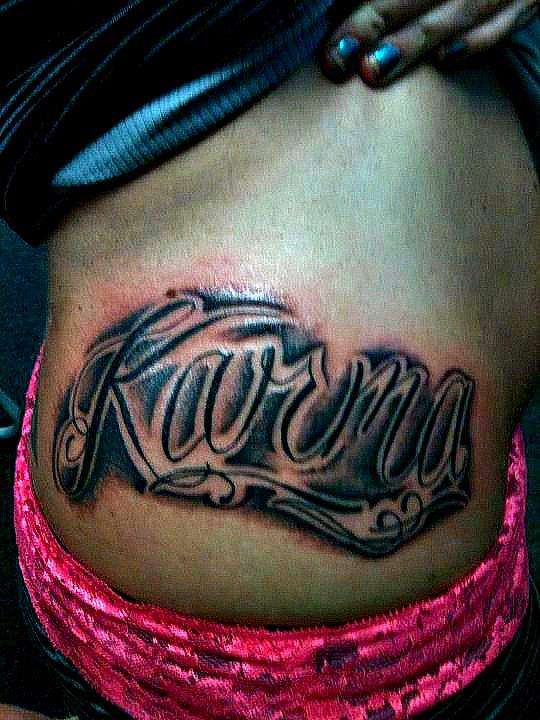 karma right side tattoo