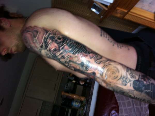 left sleeve upper arm tattoo