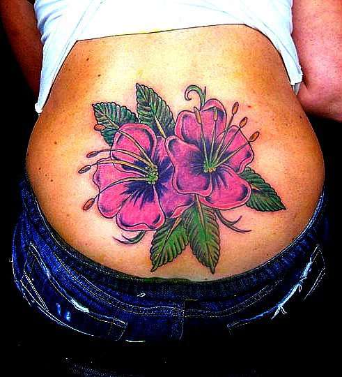 lower back lilys tattoo