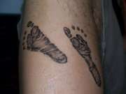 Indys Feet (5 weeks old) tattoo