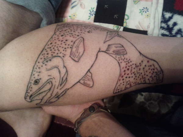a big rainbow (outline) tattoo