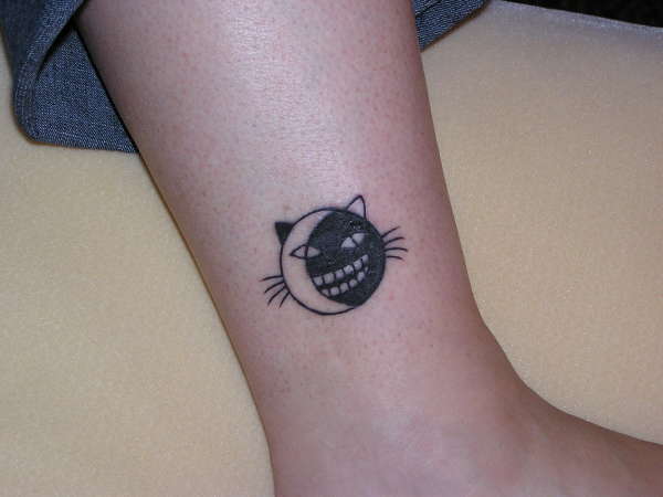 Cat Face Sun Moon tattoo