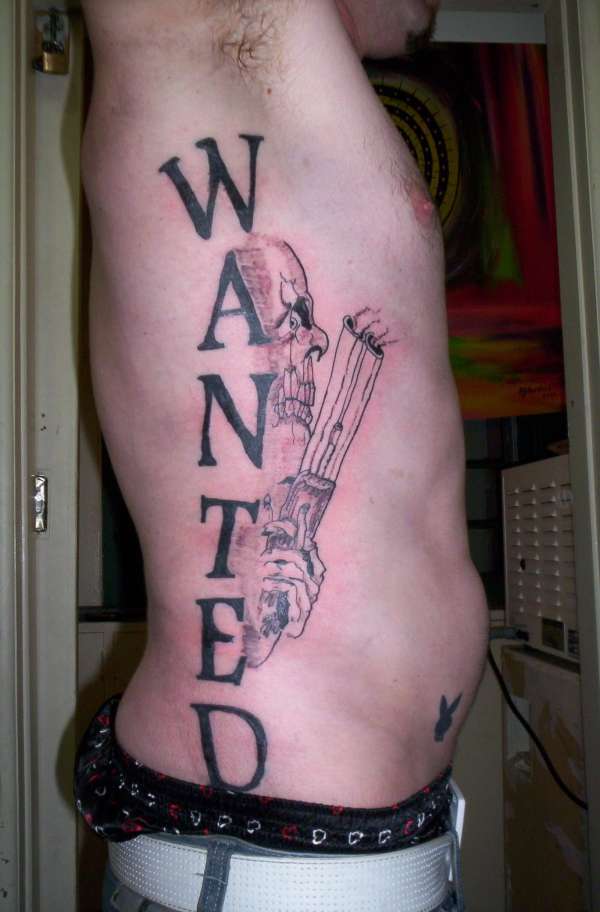wanted tattoo