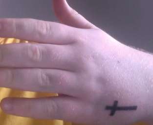 Cross on Hand tattoo