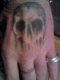 HAND TATT tattoo