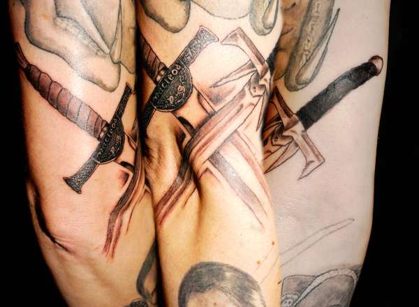 Highlander/Kurgan Crossed Swords tattoo