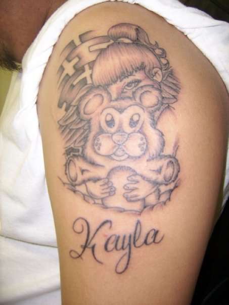 girl w bear tattoo