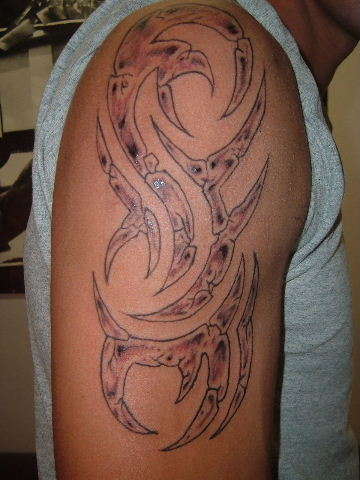 custom stone tribal tattoo