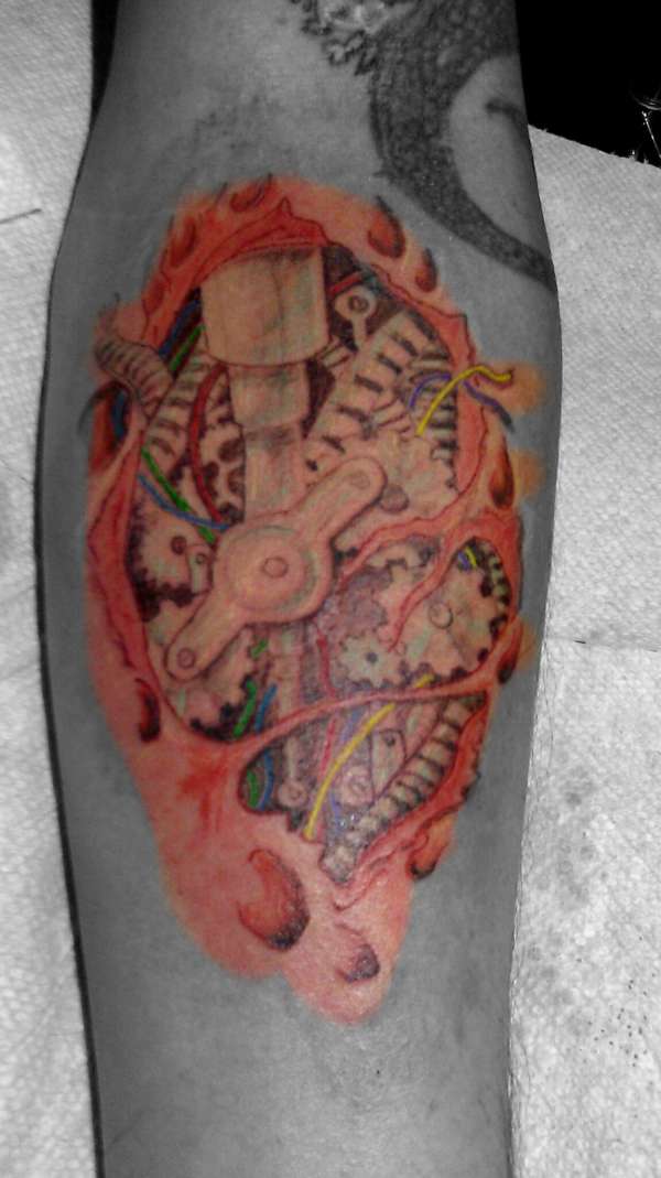 Biomechanical Tear Out Tattoo by Trickstattoo, best coolest neat tattoo