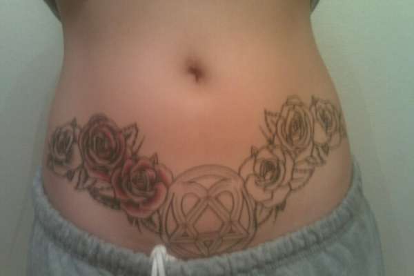 Heartagram and roses tattoo