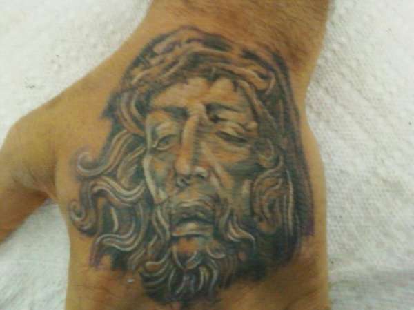 Jesus on a Hand tattoo