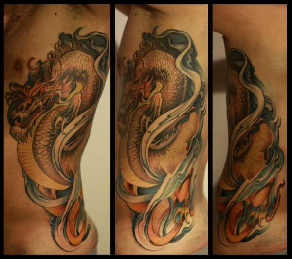 dragon on ribs tattoo