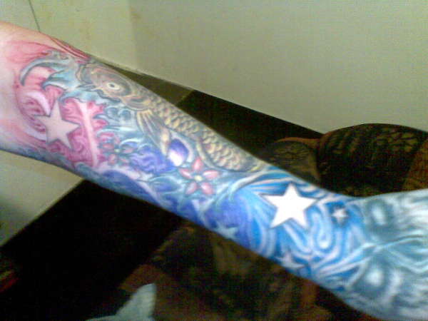 half sleeve koi and freedom to express tattoo