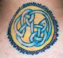 Sun with Celtic knot work tattoo