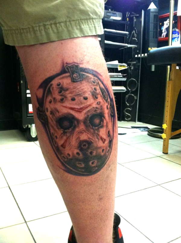 jason masks half done on my calf tattoo
