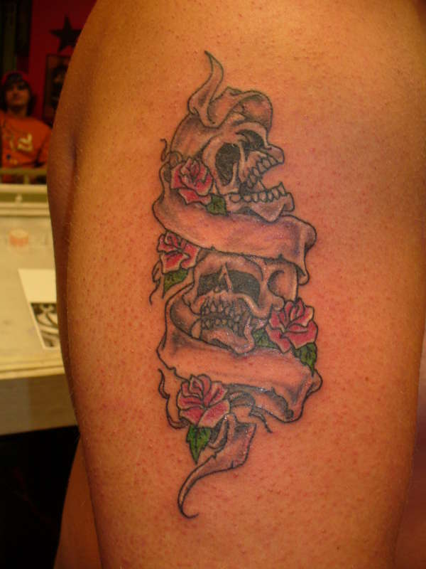 skulls and banner tattoo