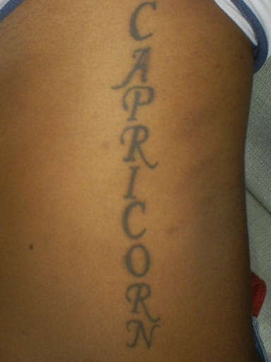 Capricorn on side tattoo