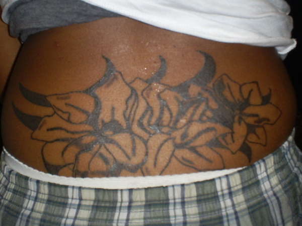 Cover Up Flowers tattoo