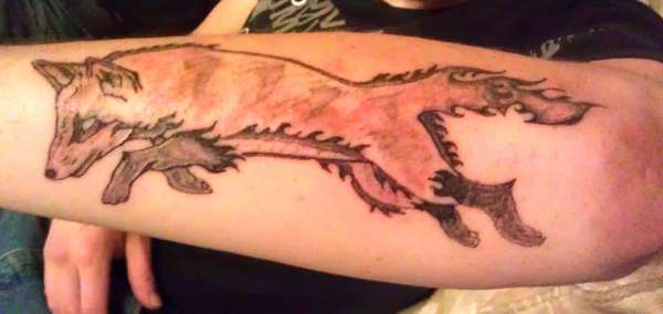 Custom Tribal Fox Tattoo by Trickstattoo healed tattoo